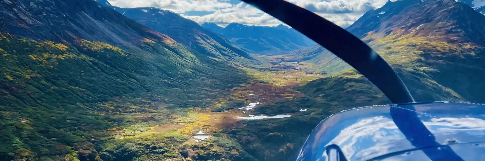 Floatplane approach through the Alaska mountains on the way to Copper River Lodge